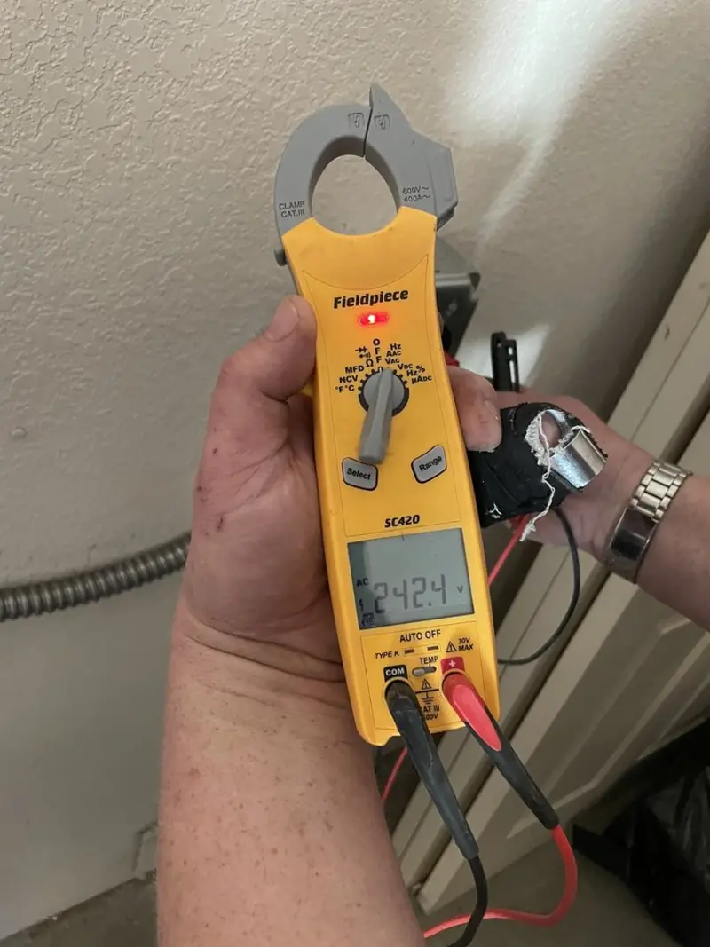Voltage testing with clamp meter during Electrical Installation Services in Spring Valley Lake